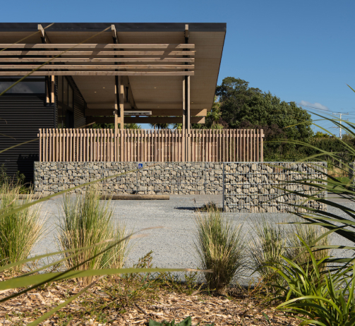 Modern timber pergola in a Wellington backyard with outdoor seating area